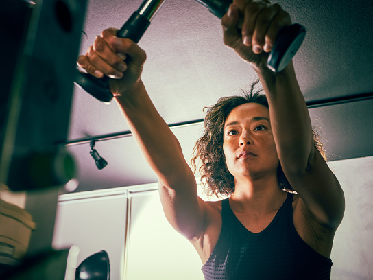 woman-using-pull-machine-4-3-544x408px