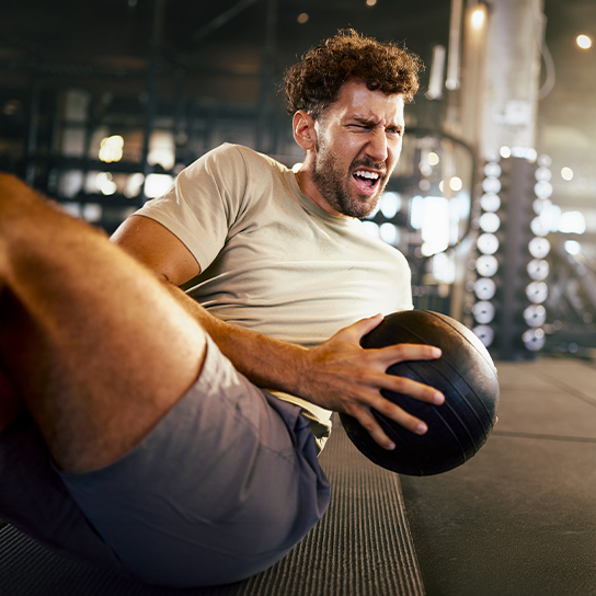 man-medicine-ball-twist-1-1-544x544px